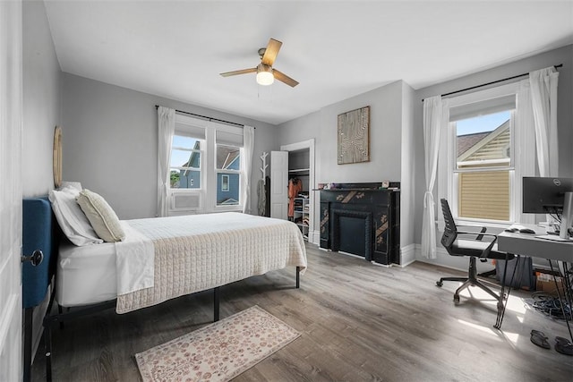 11 Walnut St, Crafton, PA 15205 - bedroom with wood finished floors, an office area, ceiling fan, and a closet