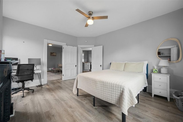 11 Walnut St, Crafton, PA 15205 - bedroom with a desk, light wood-style floors, and a ceiling fan
