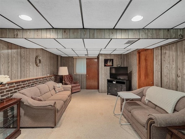 823 Clearview Dr, Penn Hills, PA 15147 - living area featuring carpet floors and wooden walls