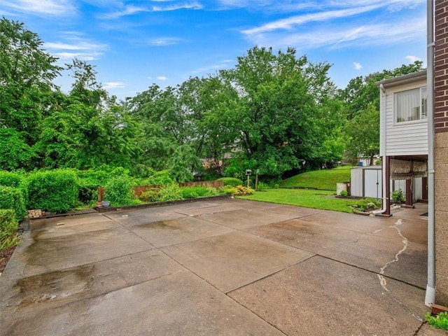 823 Clearview Dr, Penn Hills, PA 15147 - view of patio with view of wooded area