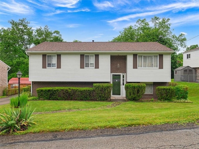 823 Clearview Dr, Penn Hills, PA 15147 - raised ranch with a front yard and brick siding