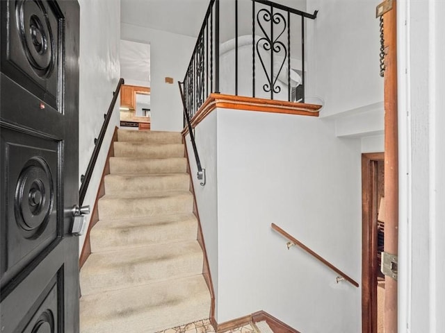 823 Clearview Dr, Penn Hills, PA 15147 - staircase featuring a towering ceiling