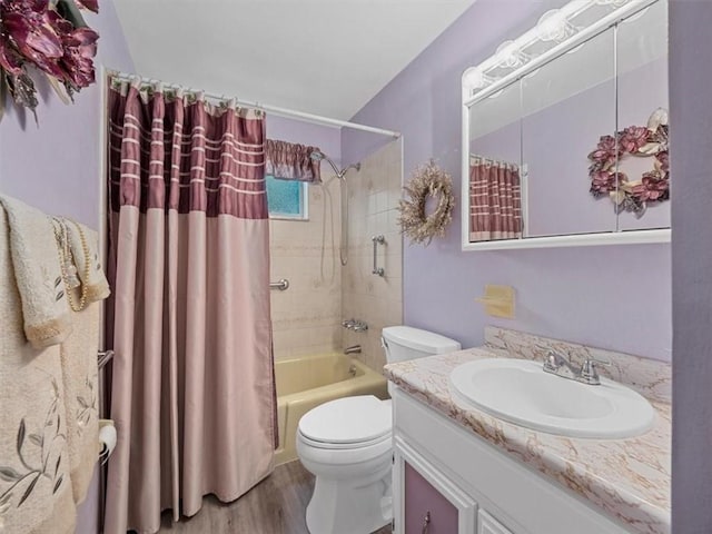 823 Clearview Dr, Penn Hills, PA 15147 - full bath with vanity, shower / bath combo with shower curtain, and wood finished floors