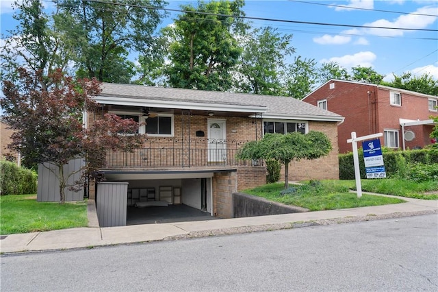 6623 Rosemoor St, Squirrel Hill, PA 15217 - view of front of home with brick siding and a carport
