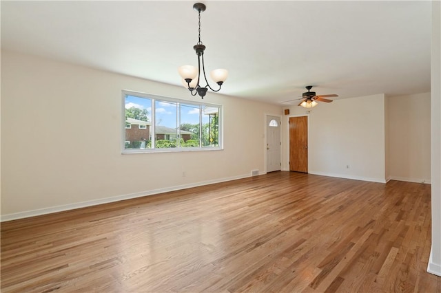 6623 Rosemoor St, Squirrel Hill, PA 15217 - empty room featuring light wood-style floors, a chandelier, and a ceiling fan
