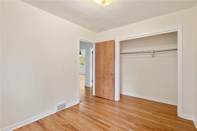 6623 Rosemoor St, Squirrel Hill, PA 15217 - unfurnished bedroom with light wood-style flooring and a closet