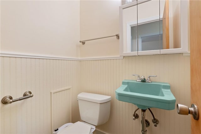 6623 Rosemoor St, Squirrel Hill, PA 15217 - bathroom with toilet and a wainscoted wall