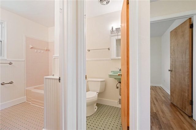 6623 Rosemoor St, Squirrel Hill, PA 15217 - bathroom with wainscoting and shower / bath combination
