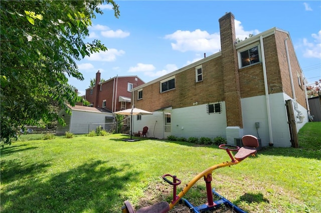 6623 Rosemoor St, Squirrel Hill, PA 15217 - back of house with a chimney