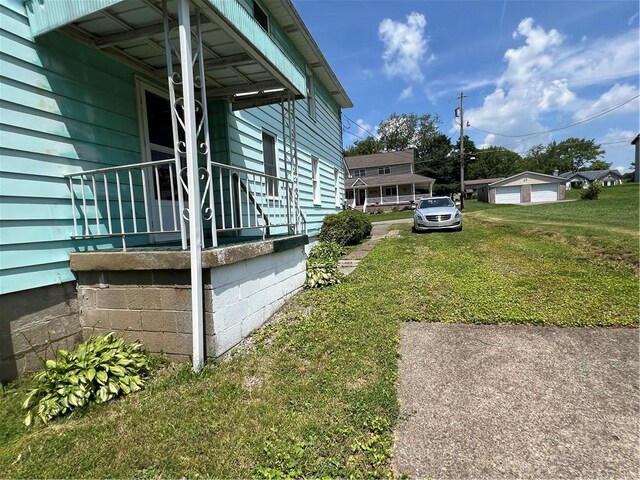 7 S Wabash St, Mount Pleasant Twp, PA 15361 - view of property exterior with a yard