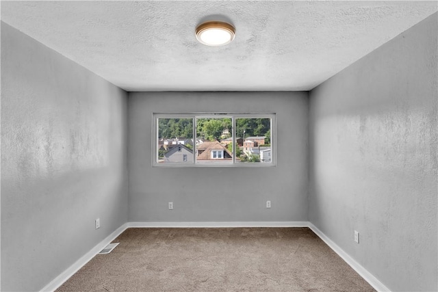 1406 Broadway Ave, Stowe Twp, PA 15136 - unfurnished room featuring carpet floors and a textured ceiling
