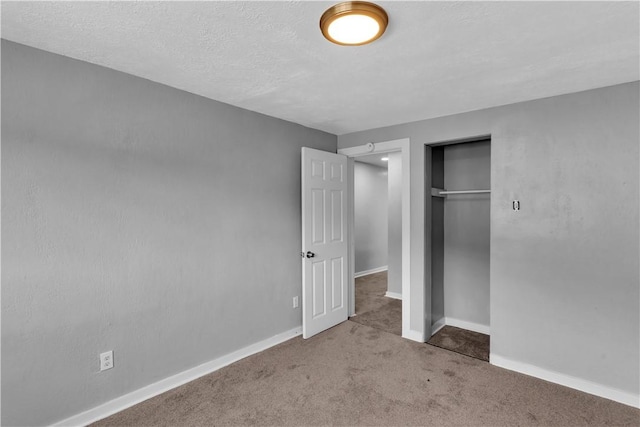 1406 Broadway Ave, Stowe Twp, PA 15136 - unfurnished bedroom with a closet, carpet floors, and a textured ceiling