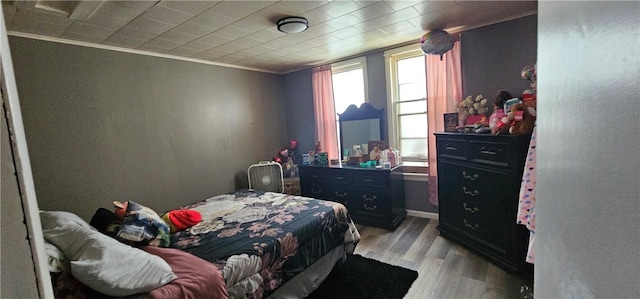705 Carlisle St, New Castle, PA 16101 - bedroom featuring crown molding and light wood finished floors