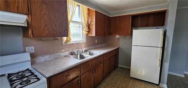 705 Carlisle St, New Castle, PA 16101 - kitchen featuring white appliances, light countertops, premium range hood, tasteful backsplash, and ornamental molding