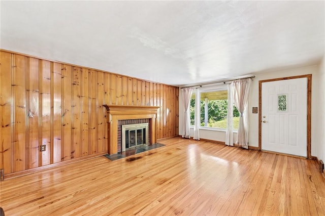 305 Beadling Rd, Mt Lebanon, PA 15228 - unfurnished living room featuring wood finished floors and a brick fireplace