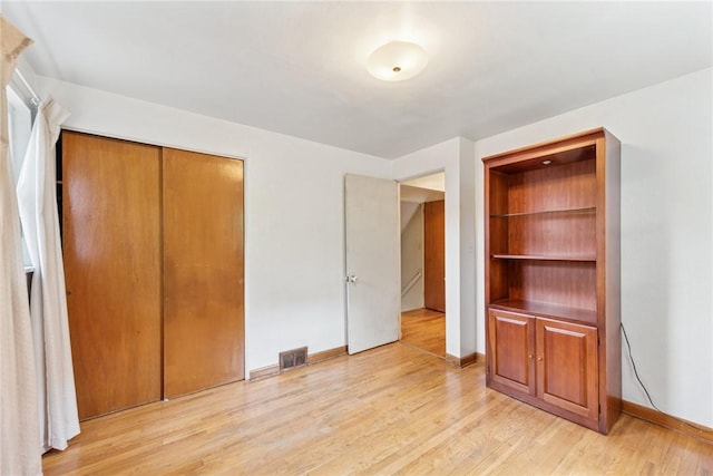 305 Beadling Rd, Mt Lebanon, PA 15228 - unfurnished bedroom with light wood finished floors and a closet