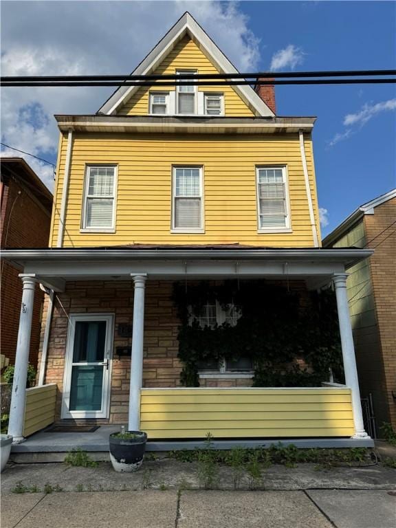 1428 Evergreen Ave, Shaler, PA 15209 - view of front of house featuring covered porch and a chimney