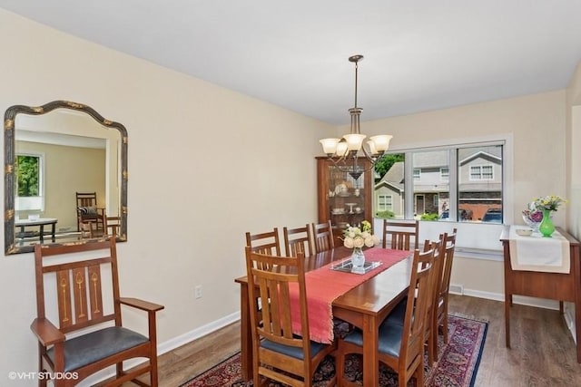9810 Three Degree Rd, Mccandless, PA 15101 - dining room with wood finished floors and a chandelier
