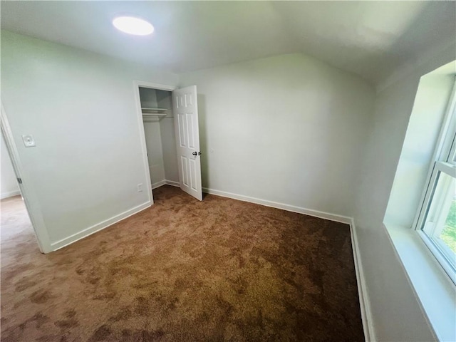 543 Burton Dr, Penn Hills, PA 15235 - unfurnished bedroom featuring carpet flooring, lofted ceiling, and a closet
