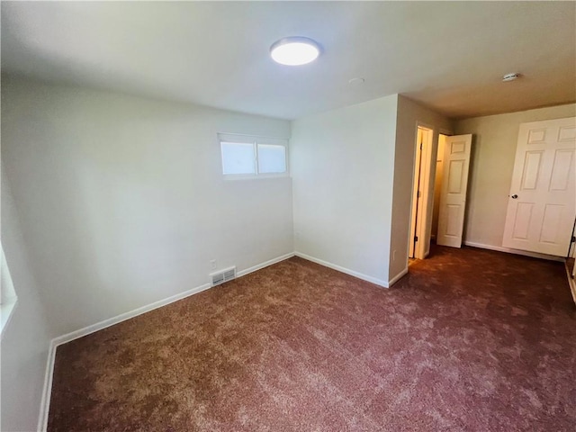 543 Burton Dr, Penn Hills, PA 15235 - empty room with dark colored carpet and baseboards