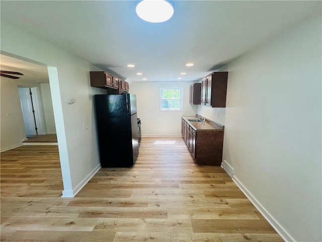 543 Burton Dr, Penn Hills, PA 15235 - kitchen featuring freestanding refrigerator, dark brown cabinets, light wood-style floors, and recessed lighting