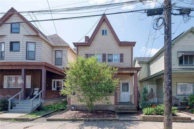 75 Wilson St, Etna, PA 15223 - view of front of home featuring a porch