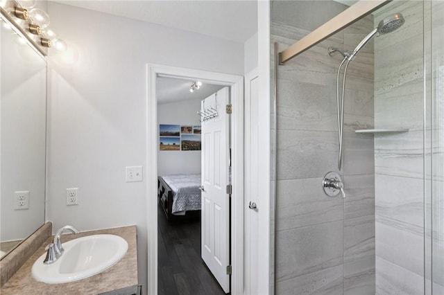 10495 Timber Edge Dr, Mccandless, PA 15090 - full bath with ensuite bath, a shower stall, vanity, and wood finished floors