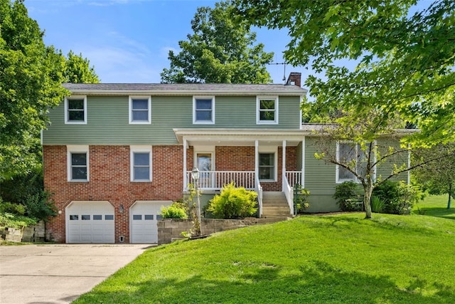32 Canter Dr, Sewickley Hills Boro, PA 15143 - view of front of property with a garage, covered porch, a chimney, concrete driveway, and a front lawn