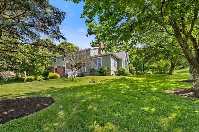 32 Canter Dr, Sewickley Hills Boro, PA 15143 - view of front of house featuring a chimney and a front lawn