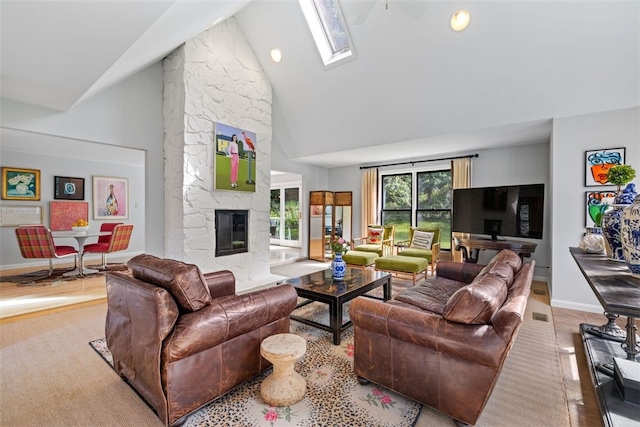 32 Canter Dr, Sewickley Hills Boro, PA 15143 - living room with high vaulted ceiling, a fireplace, and a skylight