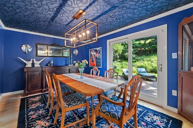 32 Canter Dr, Sewickley Hills Boro, PA 15143 - dining space featuring crown molding, an ornate ceiling, a chandelier, and light wood-style flooring