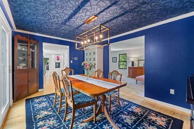 32 Canter Dr, Sewickley Hills Boro, PA 15143 - dining room with ornamental molding, a chandelier, light wood-style flooring, and an ornate ceiling