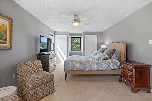32 Canter Dr, Sewickley Hills Boro, PA 15143 - bedroom featuring light colored carpet, a textured ceiling, and a ceiling fan