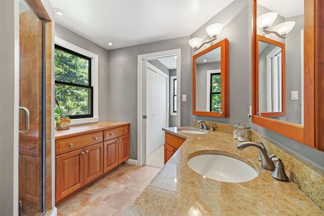 32 Canter Dr, Sewickley Hills Boro, PA 15143 - bathroom featuring double vanity and a stall shower