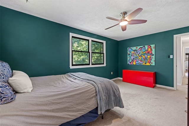 32 Canter Dr, Sewickley Hills Boro, PA 15143 - carpeted bedroom with a textured ceiling and a ceiling fan