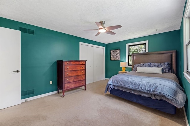 32 Canter Dr, Sewickley Hills Boro, PA 15143 - bedroom featuring a textured ceiling, a closet, carpet floors, and a ceiling fan