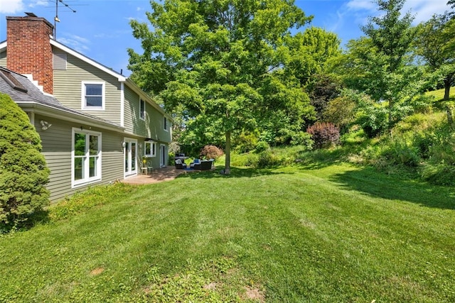 32 Canter Dr, Sewickley Hills Boro, PA 15143 - view of green lawn featuring a patio area