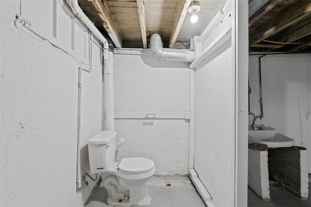 1106 Wade St, Aliquippa, PA 15001 - bathroom with toilet and unfinished concrete flooring