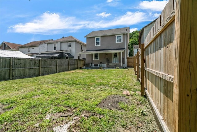 1106 Wade St, Aliquippa, PA 15001 - rear view of house with a fenced backyard, a patio area, and a residential view