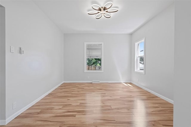 1106 Wade St, Aliquippa, PA 15001 - spare room featuring light wood-type flooring and baseboards
