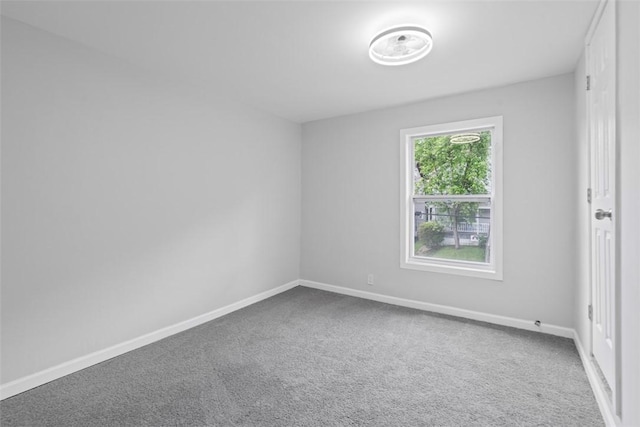 1106 Wade St, Aliquippa, PA 15001 - carpeted empty room featuring baseboards