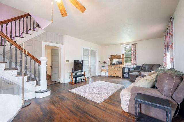 701 E 1st Ave, Derry Boro, PA 15627 - living room featuring wood finished floors, stairs, and a ceiling fan