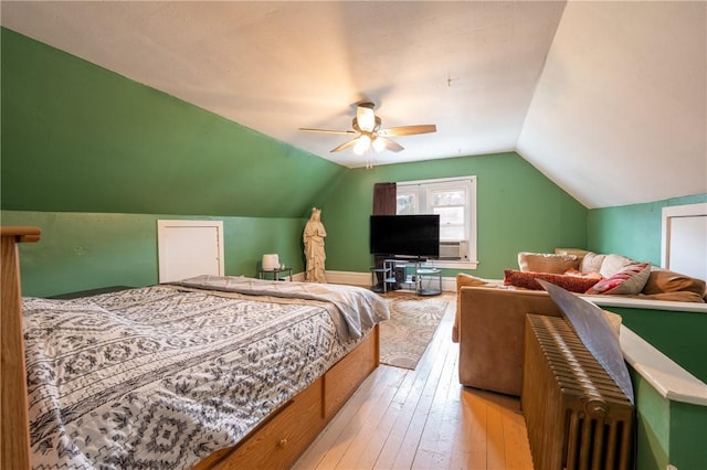 701 E 1st Ave, Derry Boro, PA 15627 - bedroom with vaulted ceiling, hardwood / wood-style flooring, a ceiling fan, and cooling unit