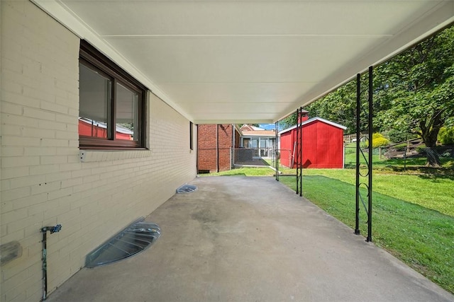 332 Garlow Dr, Penn Hills, PA 15235 - view of patio featuring a storage shed