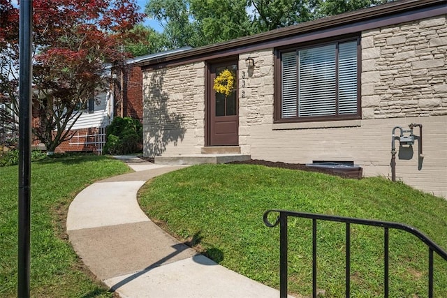 332 Garlow Dr, Penn Hills, PA 15235 - view of front of home featuring stone siding and a front lawn