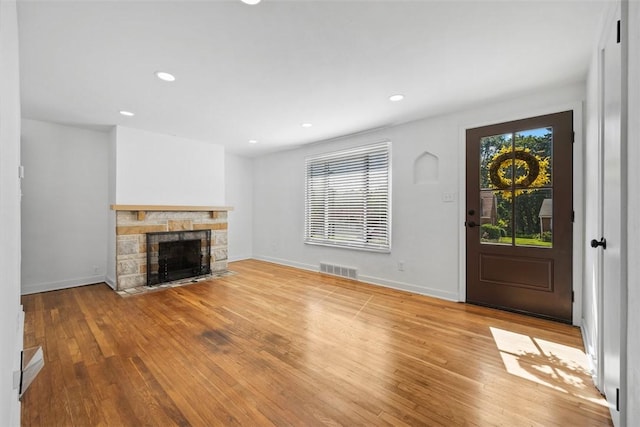 332 Garlow Dr, Penn Hills, PA 15235 - foyer featuring hardwood / wood-style floors, a fireplace, and recessed lighting