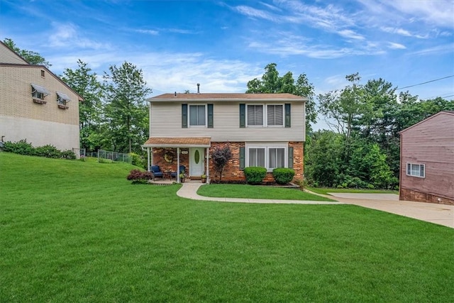 4044 Tuxey Ave, Brentwood, PA 15227 - view of front of house with a front lawn and brick siding