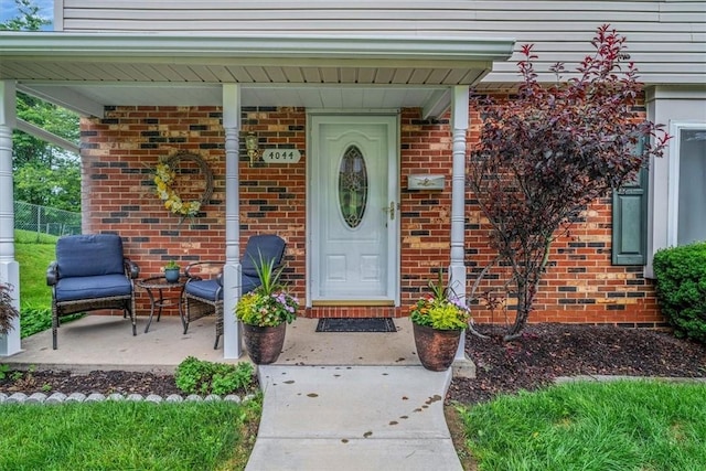 4044 Tuxey Ave, Brentwood, PA 15227 - property entrance with brick siding and covered porch