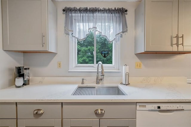 4044 Tuxey Ave, Brentwood, PA 15227 - kitchen with white dishwasher and light countertops