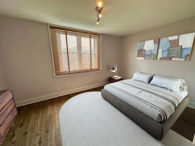 5404 Black St, Garfield, PA 15206 - bedroom featuring wood finished floors and baseboards